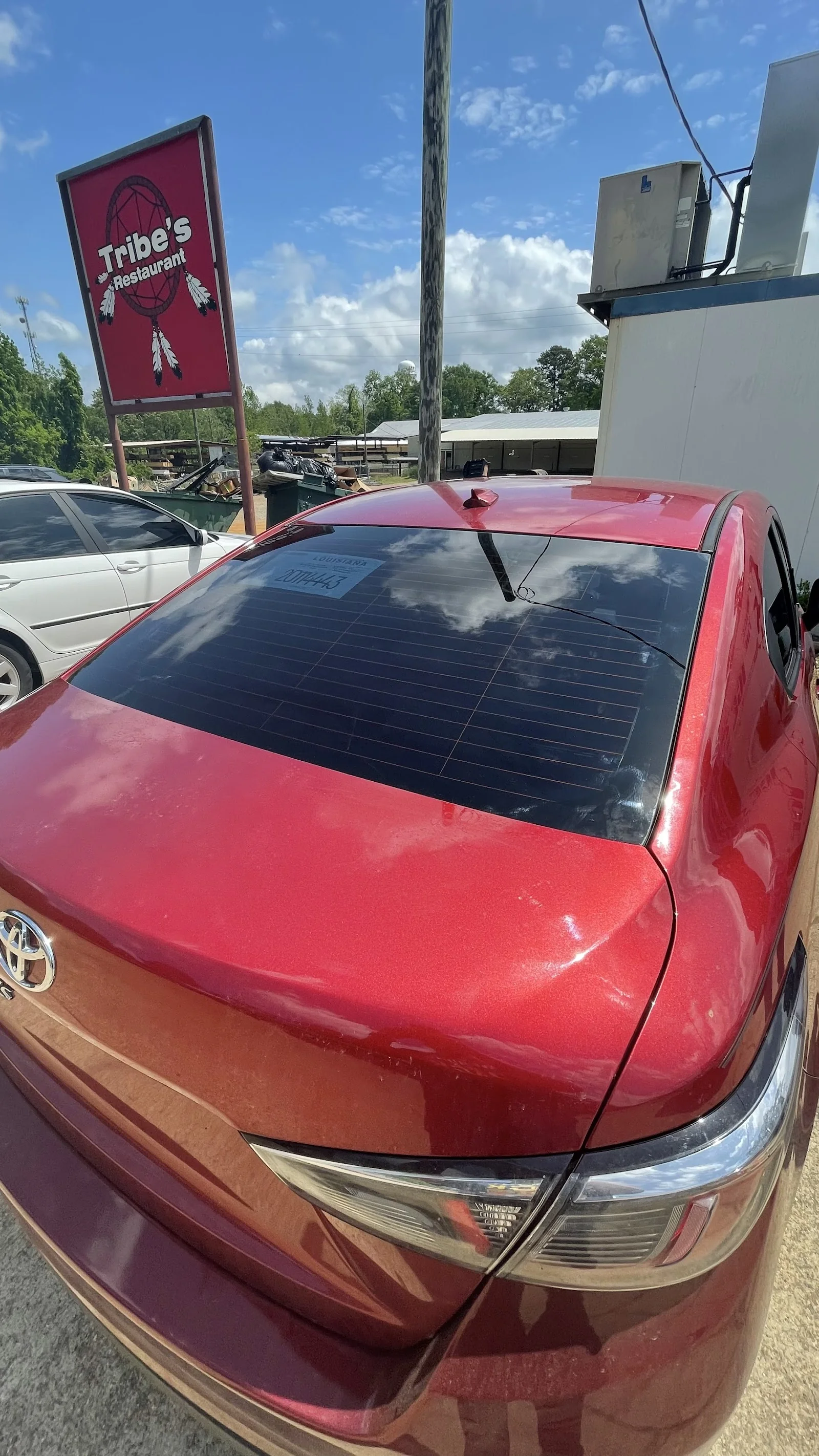 Inside One Stop Tint — shop interior and work bay